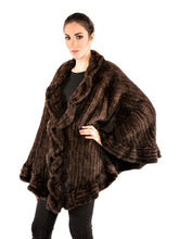 Knitted mink cape with ruffles