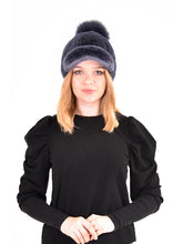 Knitted mink cap with fox fur pom pom